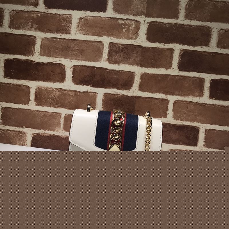 G*u*i satchel bags
